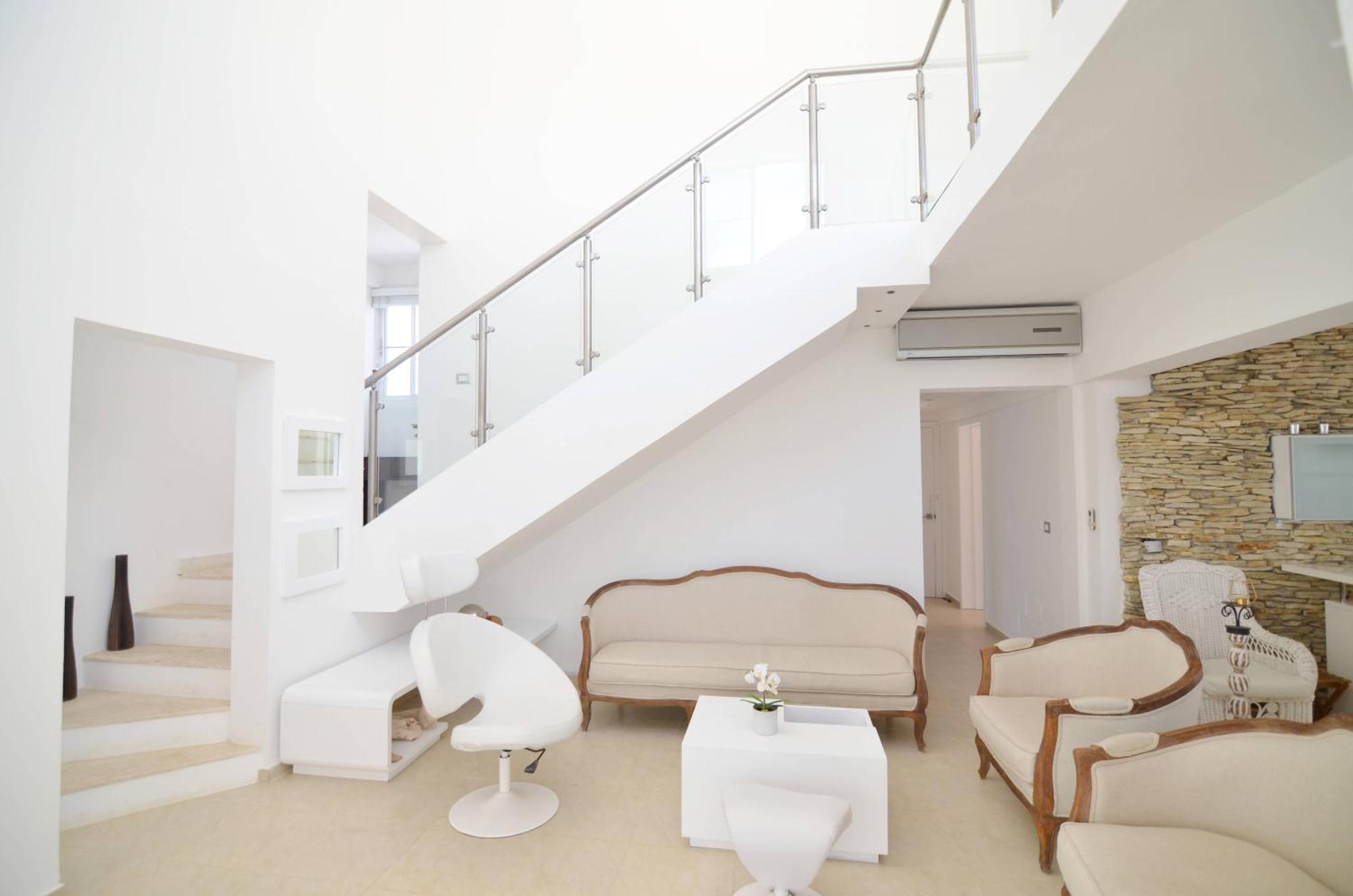 & Larimar Villa *