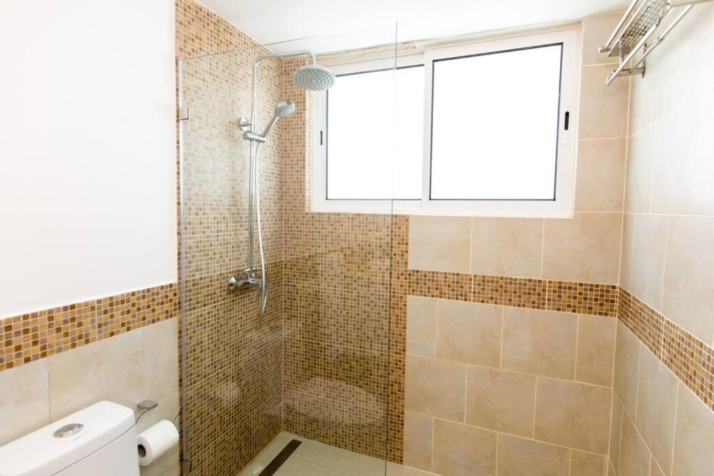 Apartamento Pristine 4br Beachfront Getaway With Pool & Rooftop