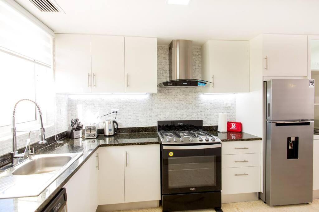 Apartamento Pristine 4br Beachfront Getaway With Pool & Rooftop *